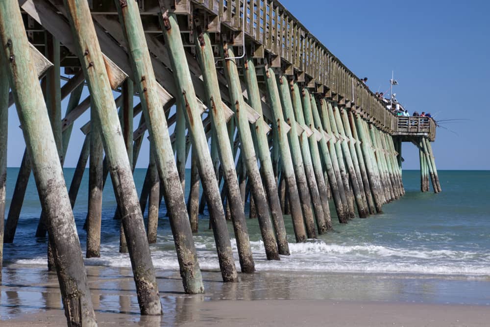 Close up of wooden pier at Myrtle State Park, which you can visit during the Carolina Country Music Festival